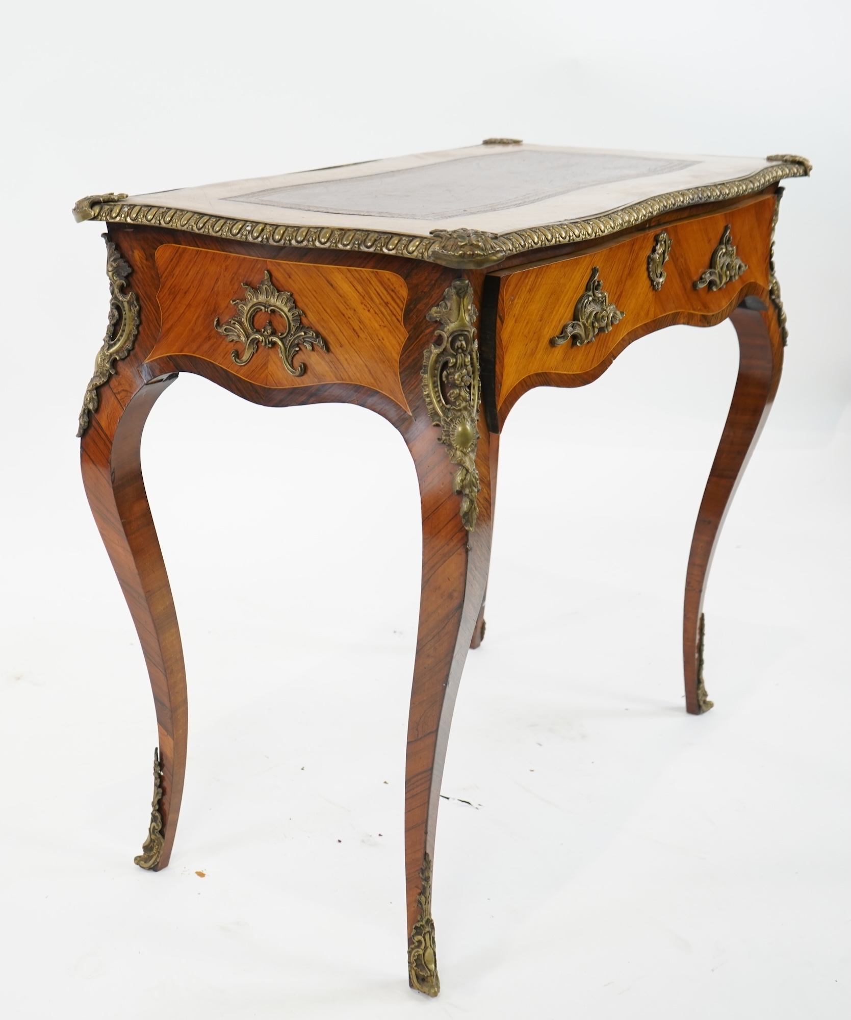 A small Louis XV style gilt metal mounted rosewood and kingwood bureau plat